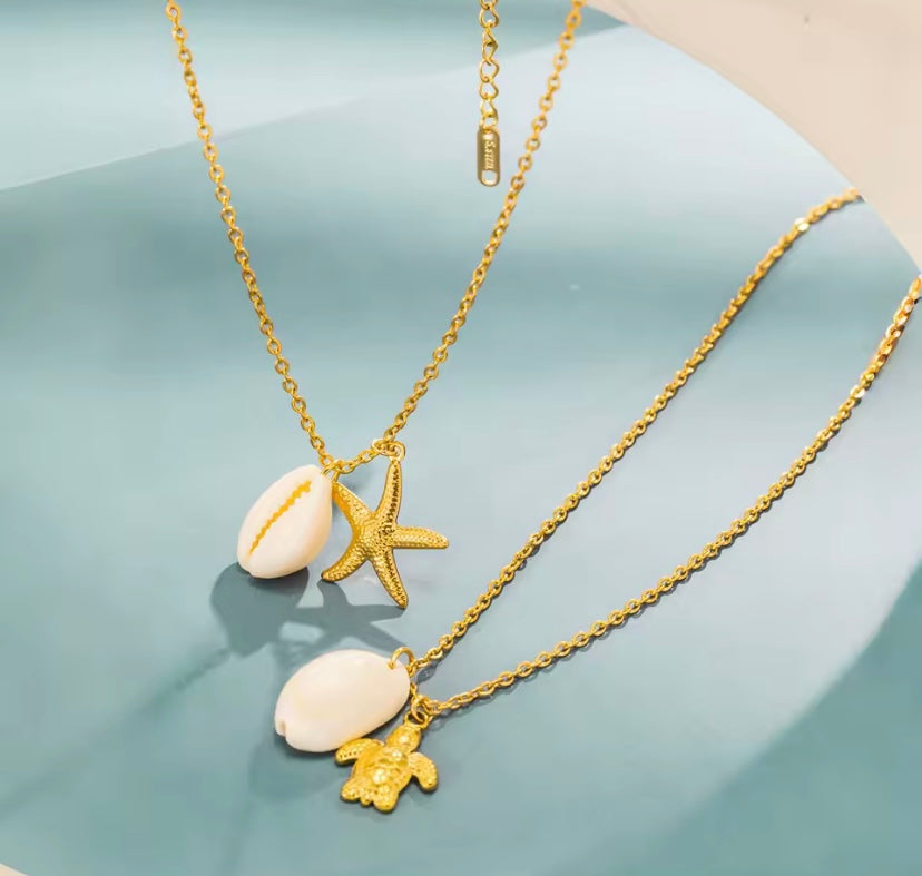 Collana oro con charms Mare